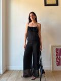 TUTA NERA CON VOLANT