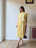 ABITO GIALLO BANANA PLISSE'
