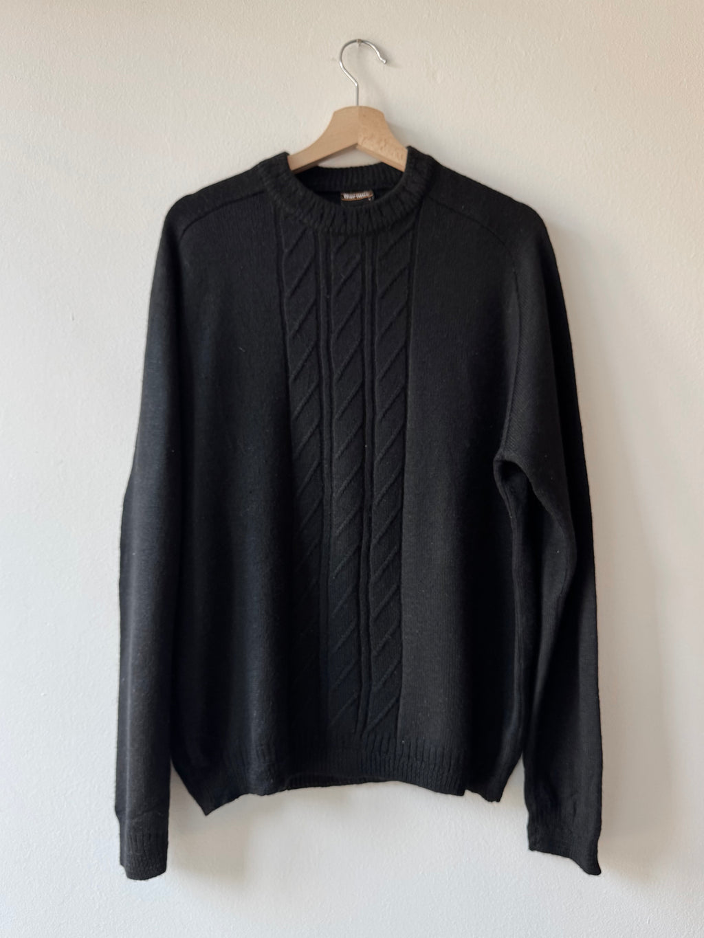 MAGLIONE NERO CON TRECCE